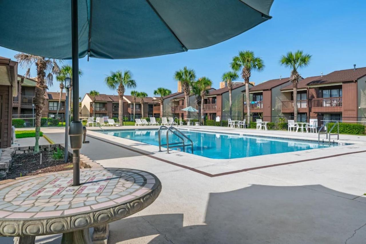 Experience Starlit Nights From Beach Happy'S Balcony Overlooking The Community Pool At Beachwalk Villa Panama City Beach Exterior photo